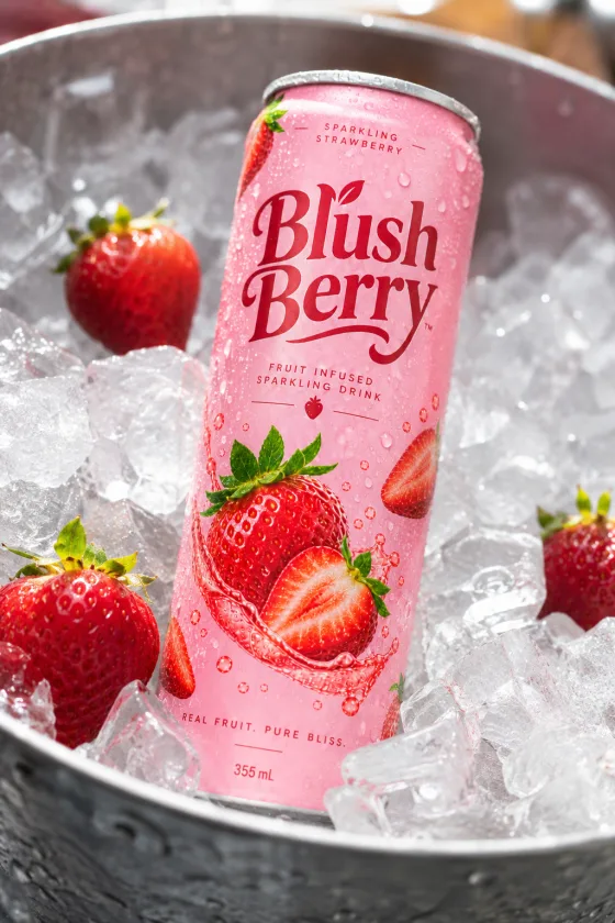 Chilled Blush Berry can nestled in ice